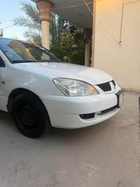 لانسر ٢٠١١ • محرك ١٦٠٠ • جنطة يسار متضرر