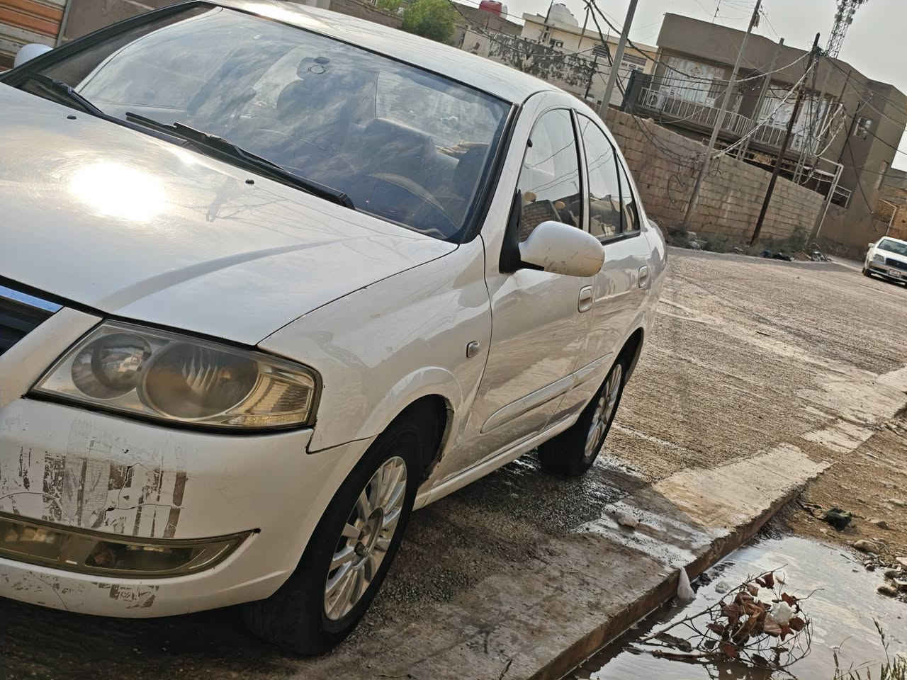 سلام عليكم
🚗 نيسان صني 2013 للبيع
​المحرك: 1800cc 
​المكان: واسط / الكوت
​الرقم: القادسية (كاملة الأوراق وجاهزة للتحويل)
​📌 أبرز المواصفات والحالة:
​تخم أطارات (تايرات) جديد
​بطارية جديدة
​المحرك والجير بحالة ممتازة جداً وما تحتاج أي مصاريف
​تبريد شغال و معروف قوته

​السعر المطلوب: 110 ورقة قابل للتفاوض البسيط للجادين.
​📞 للتواصل والاستفسار: *********** أو عبر مراسلة الخاص.

نص مكتوب في الصور:
- 36°C القادسية خصوصي
- 36°C