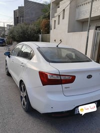 كيا ريو ١٢ اللون ابيض سياره فول مواصفات بيع + مراوس محركها دبل قطره ال...
