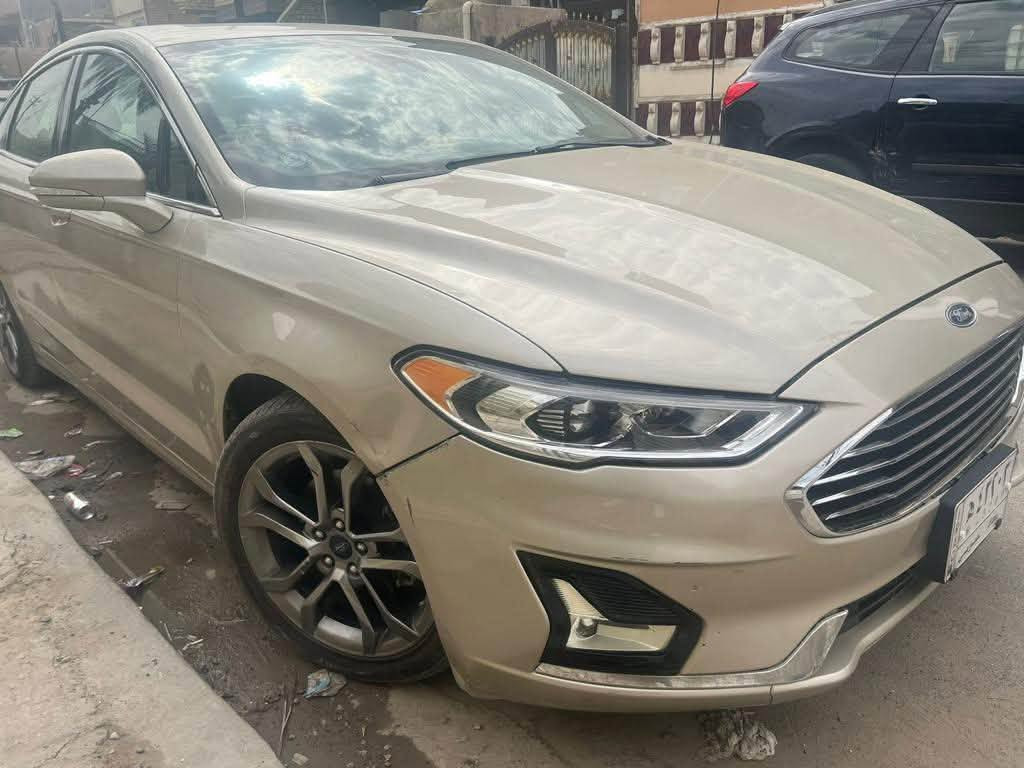 سيارة فورد فيوجن 2019 وارد امريكي (للبيع فقط )
الموصفات : 
- SEL(SEL )فوووول فووول  مواصفات للاخير 
-محرك 1500 تيربو
- كشنات جلد كهربائي بلادي  
- خزن ميموري مقعد السائق 
- حساسات امامي وخلفي ويمين ويسار 
- الصندوق كهربائي بصمة 
‏-  الابواب بصمة 
- باسورد باب السائق 
- التشغيل بصمة 
-تشغيل عن بعد 
-شاشة كبيرة وايضا شاشة ملاحة 
-كامرة دوارة وحساسات توقف ذاتي 
- اوتو هولد 
- هاند بريك كهربائي 
‏-الايرباكات كلهة سليمة
-ضربتهة بأمريكا جاملغ خلفي 
السيارة خير من الله دينار ما تتصرف عليهة 
اقتصادية بصرف البانزين
رقم بغداد بأسمي تحويل مباشر 
السعر :108$  وبيهة مجال تدلل
صور الحادث موجودة بالمنشور 
للاتصال على الرقم  ***********
