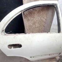 باب خلفي • بلادي • لون صدفي