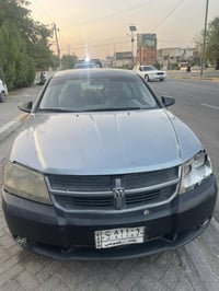 دودج أفنجر • ٢٠٠٩ • مبدلة مكينة وكير