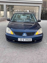 لانسر ٢٠٠٨ • گير عادي • رقم اربيل