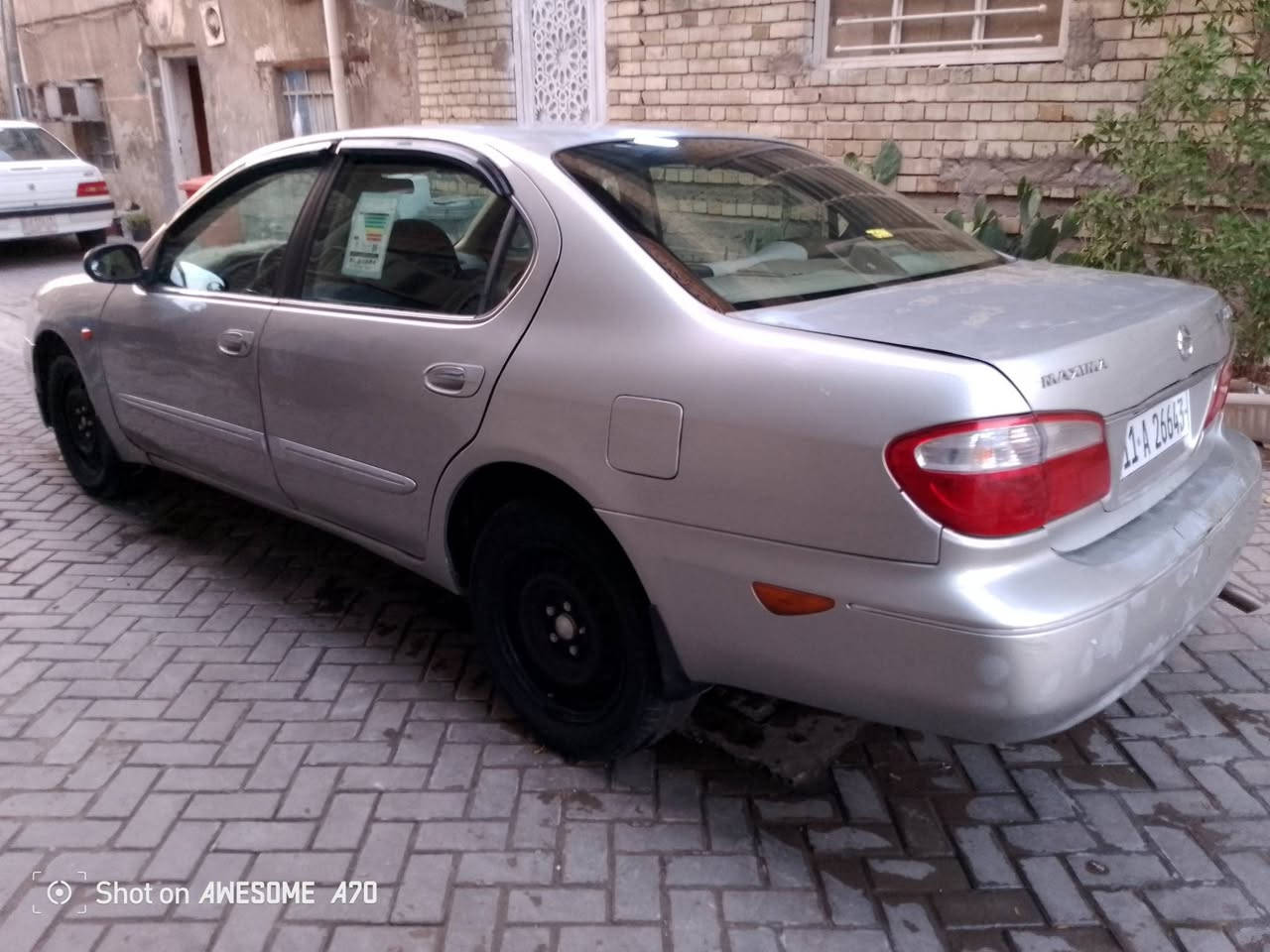 نيسان مكزمه موديل ٢٠٠٤
رقم بغداد نكليزي هزه جديده 
مكينه وكير خير من الله
تبريد شغال 
غرفه نظيفه
حداديه
السعر ٣٧
مكان بغداد قريب التربيه الثالثه حي الامانه
‏‪***********‬‏

نص مكتوب في الصور:
- Shot on AWESOME A70