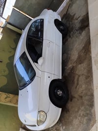 كيا ريو • ٢٠٠١ • رقم بغداد