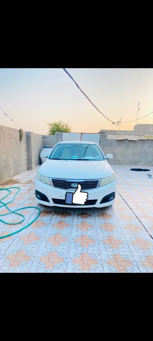 كيا اوبتيما لبيع مودل ٢٠٠٩ خليجي بيها  جامغ وبنيد بدون داخل تبريد مكينه كير حداده تخم تاير جاهزه مشروع وطني بسمي مكاني ناصريه الغراف سعر ١***********29
