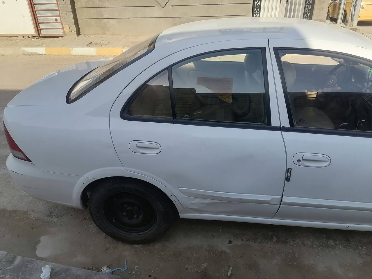 موديلها 2013  خليجي   بيها باب مضروب وعايفينه ما مصلح هم بارد يرجع والباقي  مكفول بلادي بيها شخوط وطخات خفيفه   كير مكينه 1600 مكفولات تبريد شغال صدرها بي درايم شفت دبلات جدد تخم تاير جديد سعرها 107 وبيها مجال ***********
