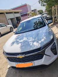 شوفر ليت ...تراكس  موديل ٢٠٢٤ رقم قادسية  ماشية ٢٢ الف اصل  لون ابيض  ...
