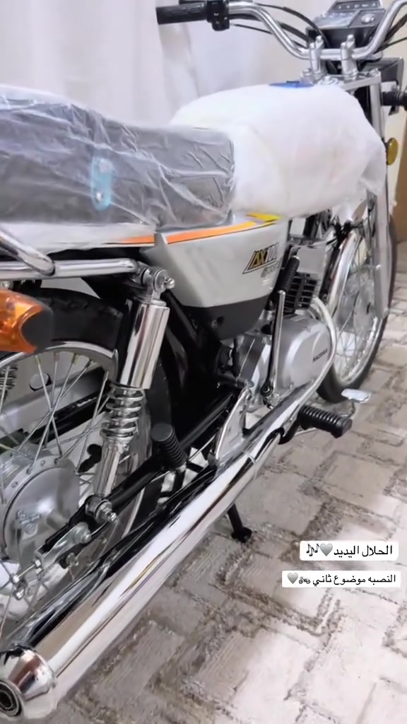 سوزوكي • AX100 • كفاله