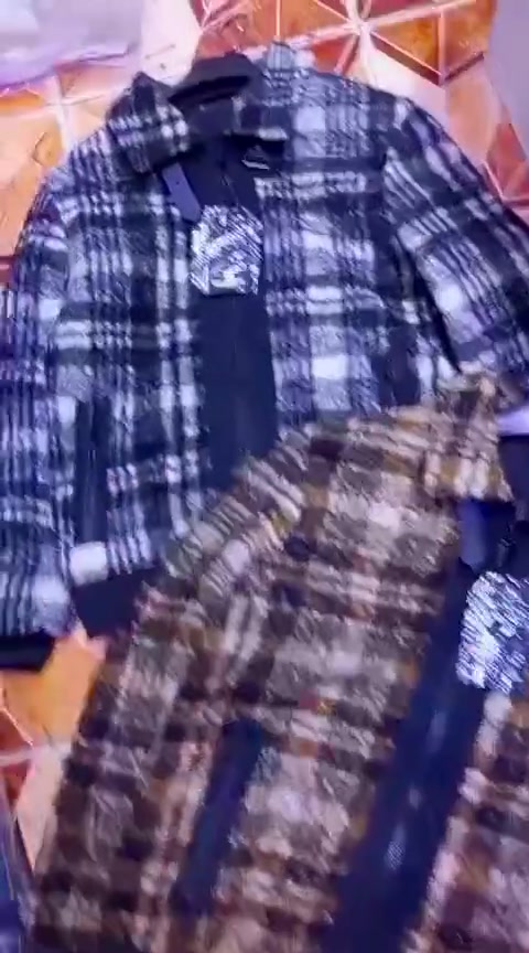محلات أزياء • علي طيب