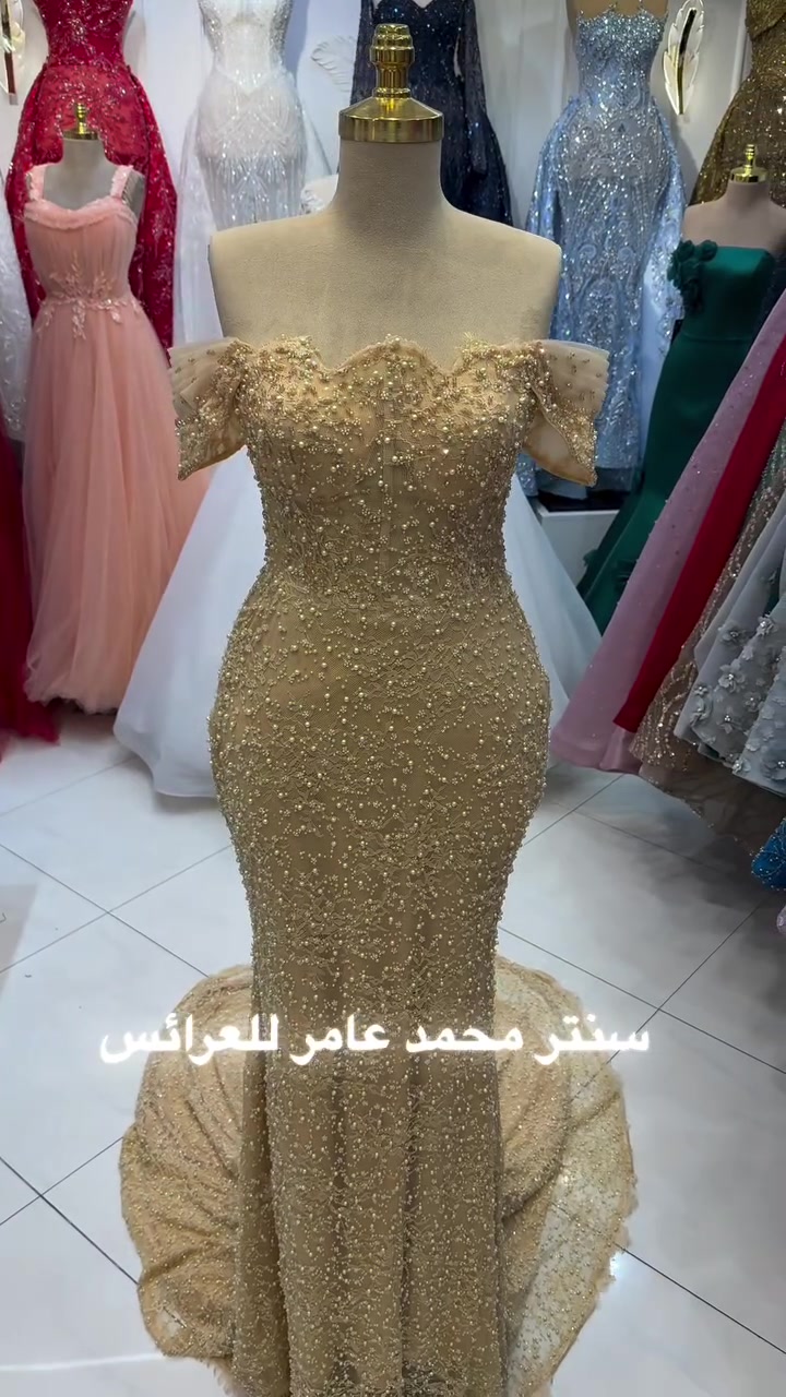 سنتر محمد عامر • الكاظميه • فساتين زفاف