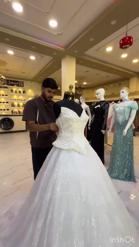 بدلات عرائس • مجمع قصي • حجز