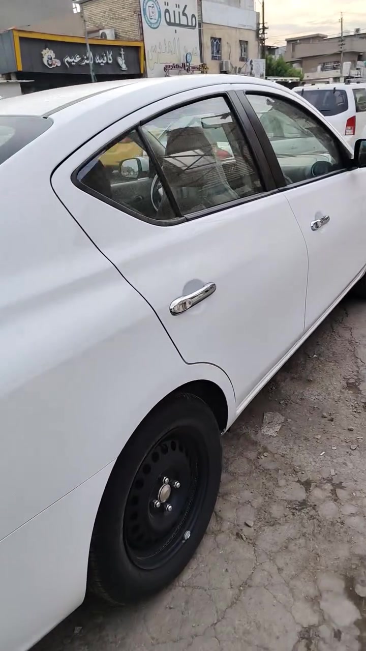 نيسان سني • رقم بغداد • مشي ٧٠٠٠