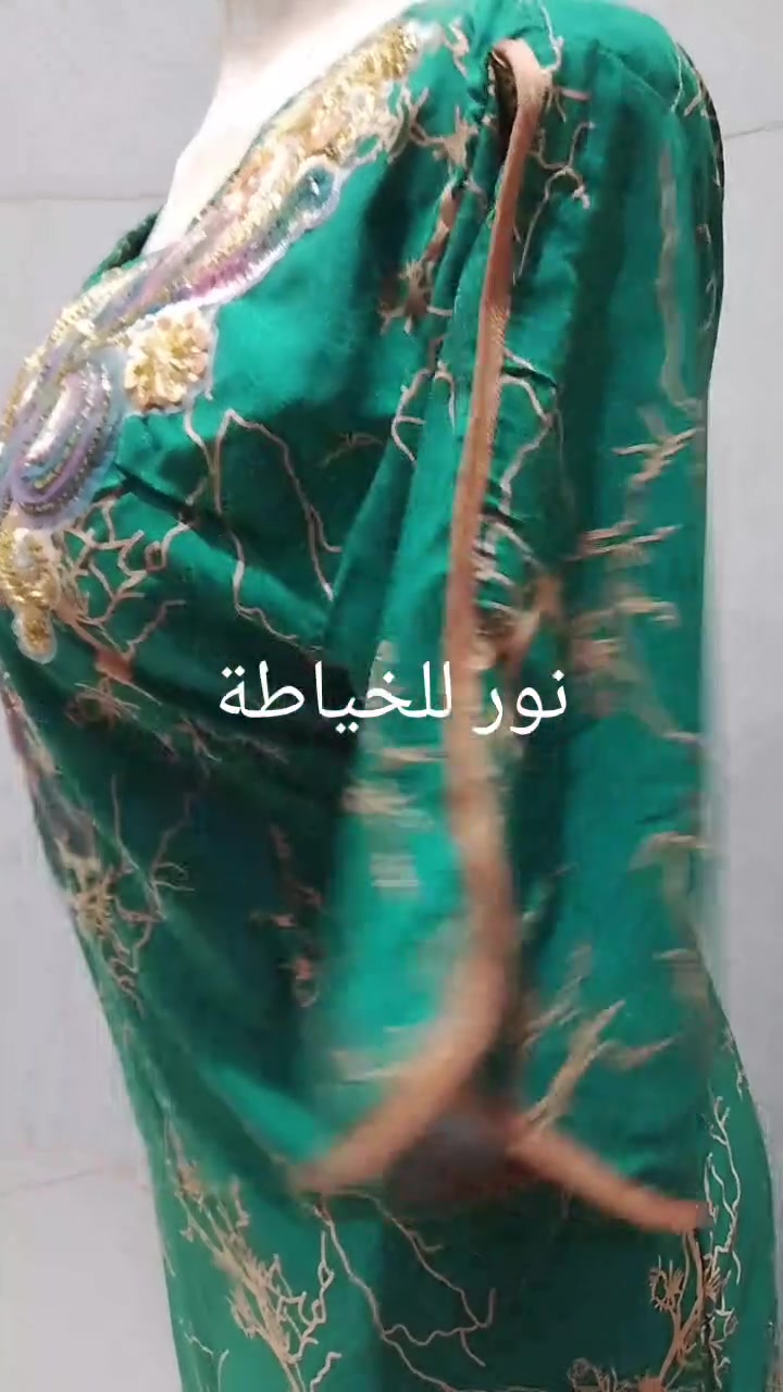 نور للخياطة • فستان مفصّل • أكمام منفوشة