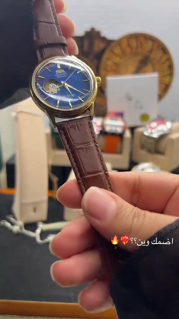 ساعات رجالية • اورينت • جلد