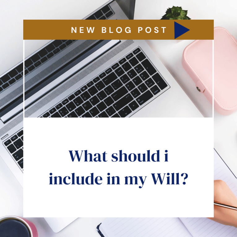 laptop on a desk with a title card overlayed that says "new blog post What should i include in my Will?"