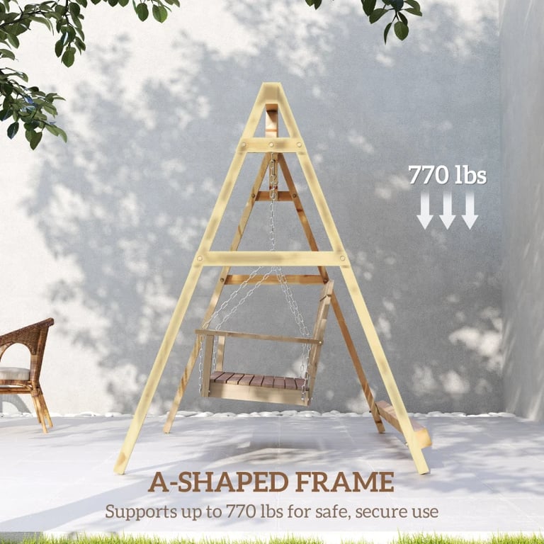 Man reading peacefully on hanging chair attached to wooden A-frame