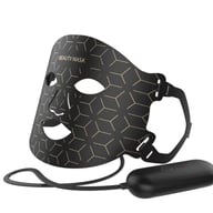 LED facial mask unboxing showing silicone mask and USB charger