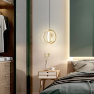 Brushed aluminum single-head pendant fixture installed in modern bedroom