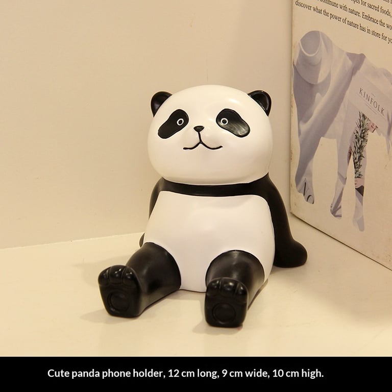 Multiple panda phone holder variations sitting together, collectible designs