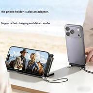 Phone stand cable charging smartphone in landscape mode outdoors, hands-free viewing