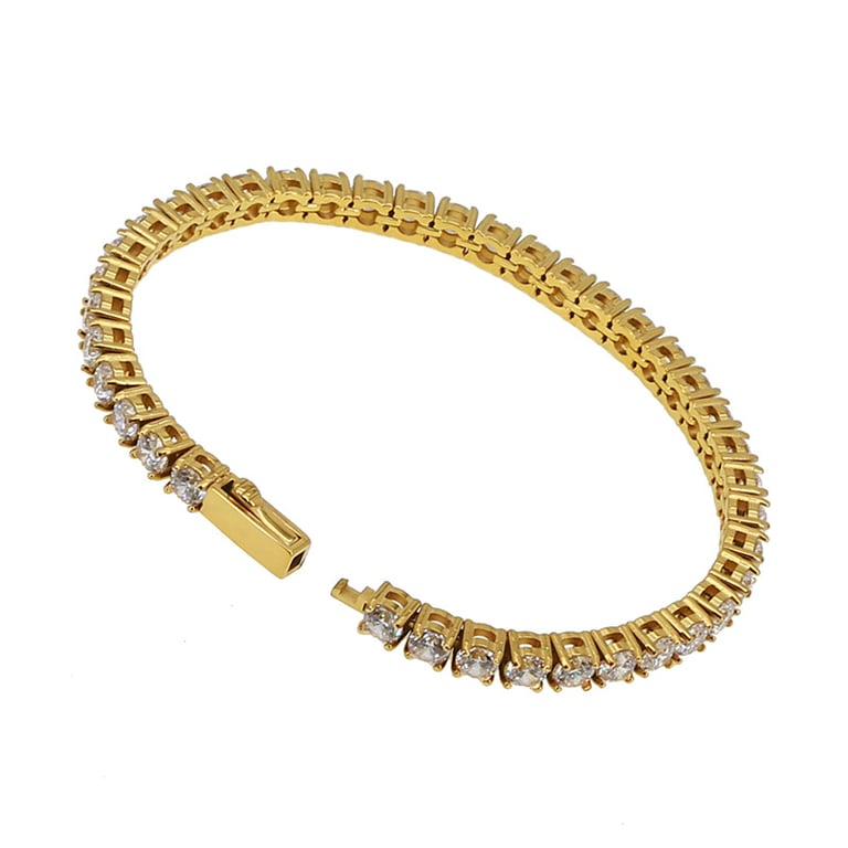 Open gold tennis chain showing rectangular clasp mechanism and stone settings clearly