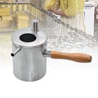 Beekeeping wax melting pot pouring melted wax into silicone foundation molds