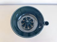 Compact stainless steel produce cleaner on Canadian kitchen countertop