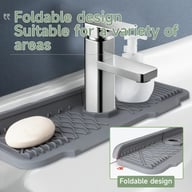Foldable gray silicone faucet splash guard with soap dispenser and kitchen towel