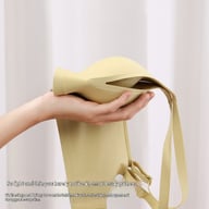 Vanilla yellow seamless wireless bra with side support and deep V-neckline