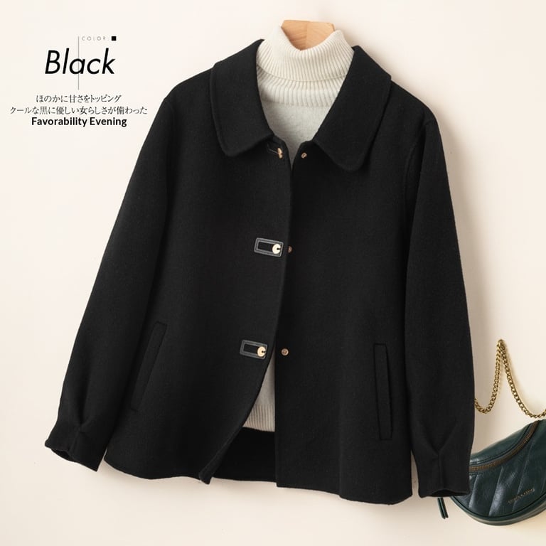 Camel double-faced wool coat, close-up of button detail and fabric texture
