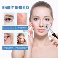 Woman using ice facial massage roller for beauty and puffiness reduction