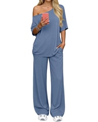 Front view of woman wearing beige and olive green loose-fitting loungewear set