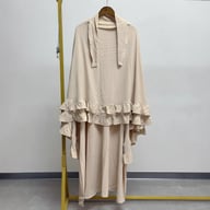 Beige women's modest robe set with attached hijab on hanger