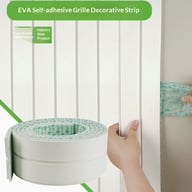 White self-adhesive EVA grille strip being applied to wall