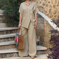 Beige striped loose-fitting pants and short-sleeve shirt coordinate set on model