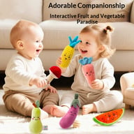 Two happy babies playing with plush vegetable and fruit rattle toys