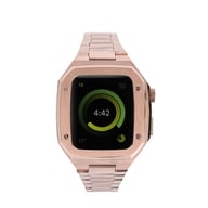 Rose gold metal Apple Watch case with integrated steel band, luxury finish