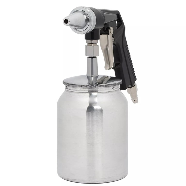 Close-up of air sandblasting gun nozzle and trigger mechanism detail