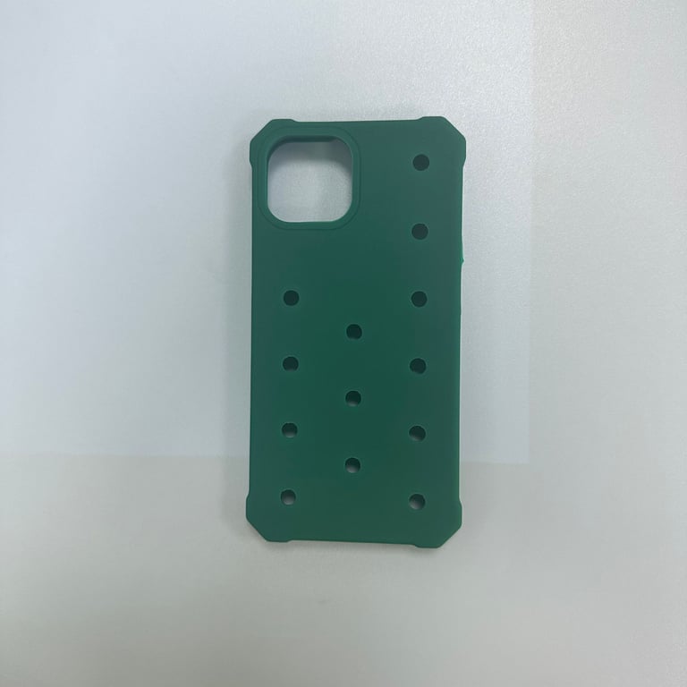 Close-up of silicone case showing precise hole pattern and camera cutout