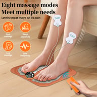 Woman using smart foot massage mat with wireless remote and electrode pads for pain relief