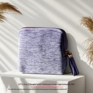 Purple, green, and pink velvet travel pouches displayed showing color variety