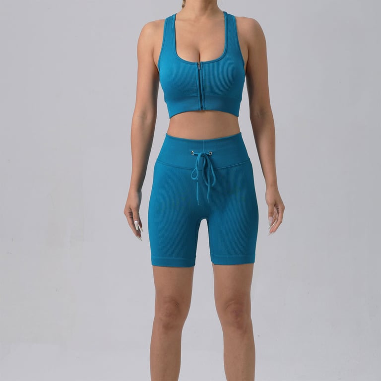 Teal ribbed sports bra and shorts set showing quality construction and fit