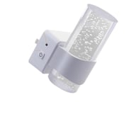 Close-up of LED night light power button and light sensor