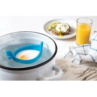 Blue silicone egg poacher gondola boat in boiling water with breakfast scene