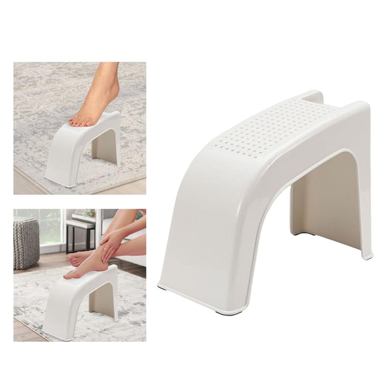 White plastic shower foot rest stand with durable construction detail