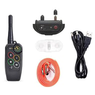 Remote dog training collar system components laid out on white