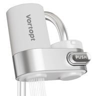 All-English faucet filter with push button and purified water stream flowing