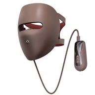 Close-up of LED facial mask showing red, blue, infrared light therapy wavelengths