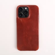 Red leather drop-resistant iPhone case isolated on white background